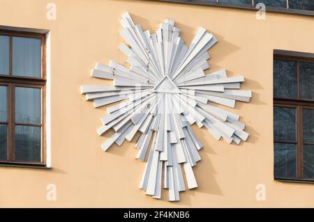White religious relief decoration on a facade of an old living house in Saint-Petersburg, Russia Stock Photo