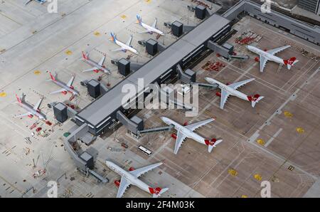 Aerial view of aircraft parked up at Terminal 2, Manchester International Airport. March 2021 Stock Photo