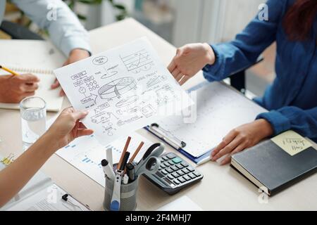 Business colleagues discussing ideas of business development in post COVID world Stock Photo
