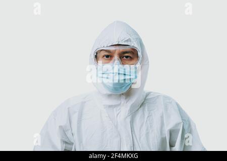 The doctor wearing personal protective equipment or ppe, mask, goggle and suit to protect COVID-19 infection. coronavirus, medical, healthcare concept Stock Photo