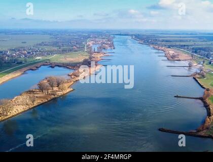 This is a drone image taken above the river Lek in the Netherlands. This is between the villages of Nieuwpoort and Schoonhoven. Stock Photo