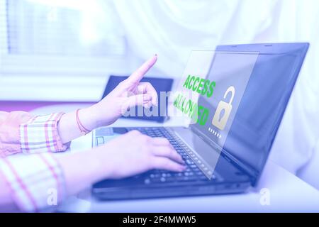 Authentication technology on computer screen. Concept of a Secure access allowed granted by valid pasword, cyber security on internet with, person wom Stock Photo