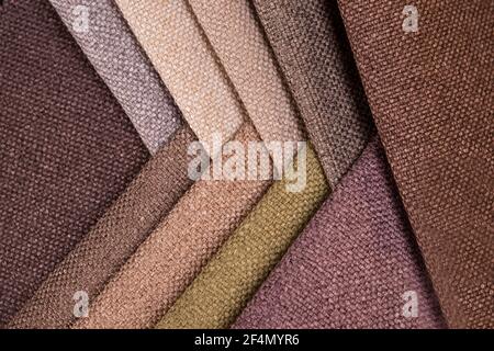 Light Set Sail Champagne and grey colors gunny textile samples. Stock Photo