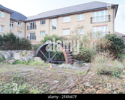 Milton Regis, Kent, UK. 22nd March 2021. Swale Council have announced in partnership with Sittingbourne Society & East Kent Engineering Partnership to enhance the site of an ancient watermill situated within the residential area of Periwinkle Close, Milton Regis. Swale have purchased the area surrounding the mill wheel which dates back to Roman times. Archaeological investigations in the 1960’s found Roman Samian pottery shards on the site, suggesting it’s use as a mill spanned two millennia. The site pictured today, work is expected to start in June. Credit: James Bell/Alamy Live News Stock Photo