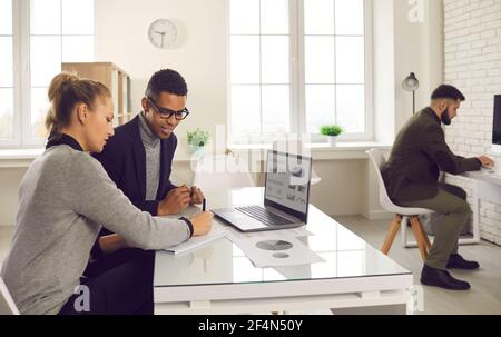 People meeting in office, working on project, analyzing data and making business plan Stock Photo