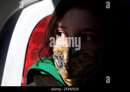 12 year-old boy looking out of the bus window, Barcelona Spain. Stock Photo