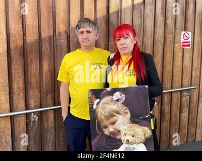 Nigel and Karina Driscoll, the parents of Melody Driscoll, outside of Southwark coroners Court in London. During an inquest into her death, Melody's mother and stepfather claimed that doctors ignored their concerns before reducing her pain medication. Picture date: Monday March 22, 2021. Stock Photo