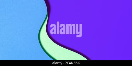Abstract geometric paper texture banner background. Blue purple green waves and curved lines papercut composition Stock Photo