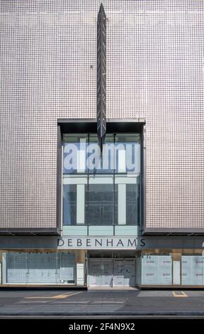Debenhams flagship store in Oxford Street, now closed, displays demolition posters in the ground floor windows as London’s premier shopping street remains empty during Coronavirus lockdown. Credit: Malcolm Park/Alamy Live News. Stock Photo
