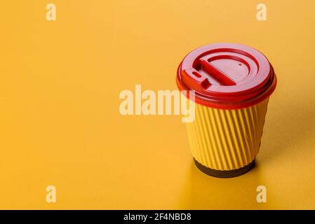 Disposable dishes made of environmentally friendly brown cardboard recycled from paper waste Stock Photo