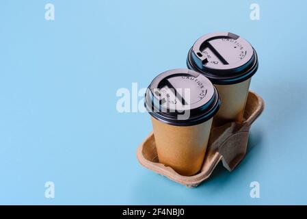 Disposable dishes made of environmentally friendly brown cardboard recycled from paper waste Stock Photo