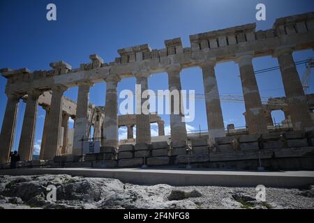 Athens, Greece. 22nd Mar., 2021. The Temple of Parthenon on Acropolis Hill is seen during the first day of the reopening of the archaeological sites, in Athens, Greece. ©Elias Verdi/Alamy Live News Stock Photo