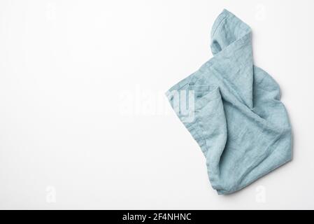 Teal kitchen textile folded isolated on white background Stock Photo