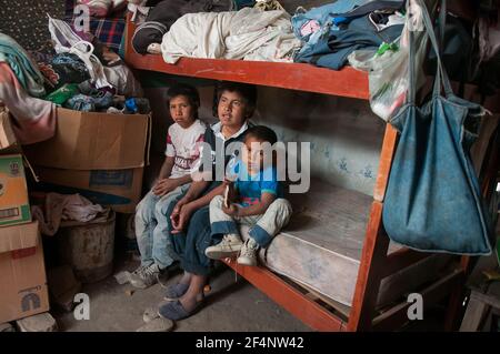 Chaco Province. Argentine. 15-01-2019. Indigenous brothers at their room in the Chaco Province, North of Argentine. Stock Photo