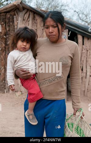 Chaco Province. Argentine. 15-01-2019. Indigenous mother and daughter at their village in the Chaco Province, North of Argentine. Stock Photo