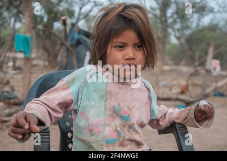 Chaco Province. Argentine. 15-01-2019. Portrait of an indigenous girl at her village in the Chaco Province, North of Argentine. Stock Photo