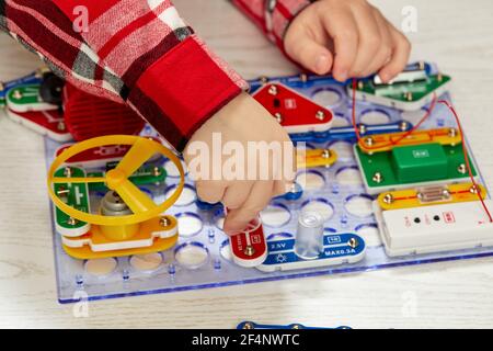 children playing with electronic constructor at studio Stock Photo