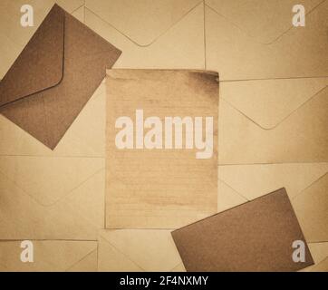 Vintage old brown envelope and paper background texture top view, Flat lay copy space, business, education, antique, rustic concept Stock Photo