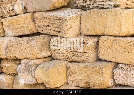 Heap of shell bricks blocks sand material texture background. Stock Photo