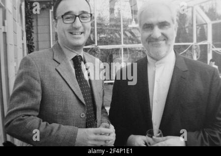 Switzerland: Iranian Foreign Minister Mohammed Dschawad Sarif (Zarif) talking to the Serbian collegue Dejan Ralevic at the 35th year of the revolution Stock Photo