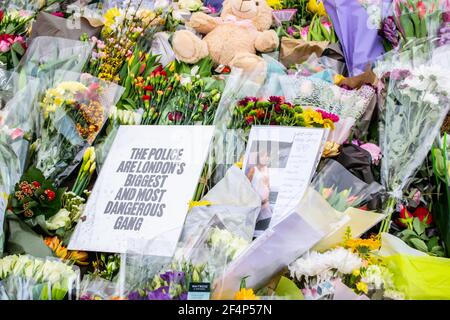 CLAPHAM, LONDON, ENGLAND- 16 March 2021: Flowers and tributes at Clapham Common Bandstand, in memory of Sarah Everard, who was murdered by a police of