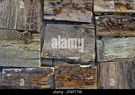 The mosaic is composed of many old half-ruined rotten boards Stock Photo
