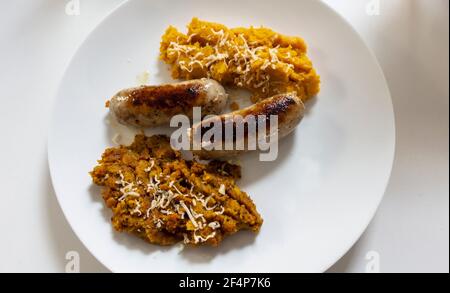 Sausages and lintels and sweet potato mash Stock Photo