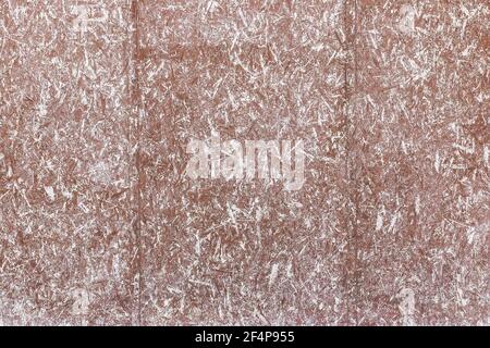 Brown and white surface paint on the press wood texture of the chipboard background. Stock Photo