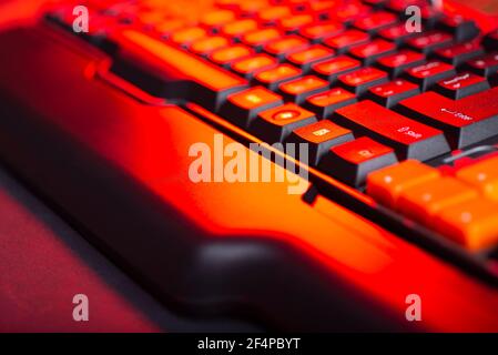 Gaming keyboard from computer close-up with color backlight. Stock Photo