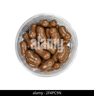 Chocolate, sweet crunchy snack isolated on white background. Chocolate balls on white background. chocolate covered corn flips. Stock Photo