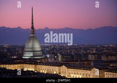 Night view of the illuminated Mole Antonelliana. Turin, Italy - March 2021 Stock Photo