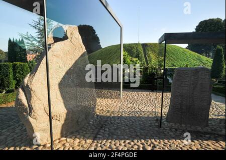 Massive carved runestones Jellingstenene (Jelling stones) from X century, on the left king Harald Bluetooth Gormsson's runestone from 983 in memory of Stock Photo