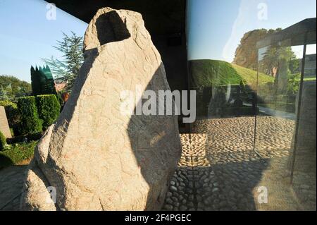 Massive carved runestones Jellingstenene (Jelling stones) from X century, on the left king Harald Bluetooth Gormsson's runestone from 983 in memory of Stock Photo