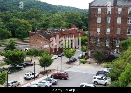 Downtown Lynchburg, VA, USA. View of Washington St, with industrial buildings repurposed as lofts and small businesses. Stock Photo