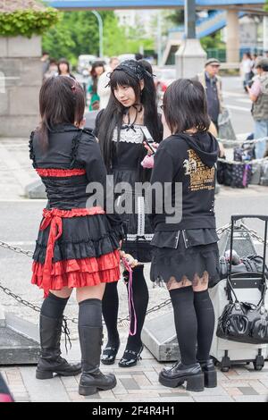 Three Japanese Gothic Lolitas congregated in Harajuku, Tokyo, Japan Stock Photo