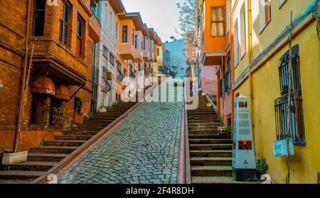 Balat, Istanbul, Turkey - February 23, 2021 - street photography of a  street in the historic Balat area with traditional colorful houses Stock Photo
