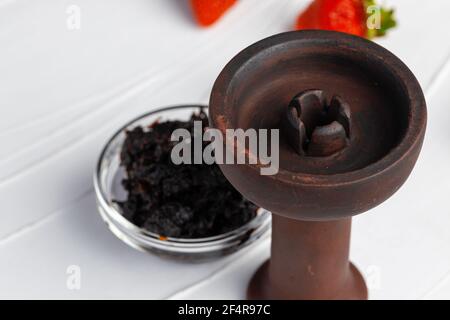 Empty hookah shaft close up on table with fresh fruit Stock Photo
