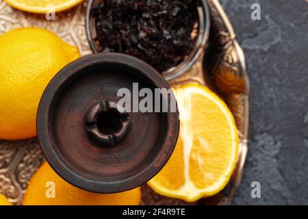 Empty hookah shaft close up on table with fresh fruit Stock Photo
