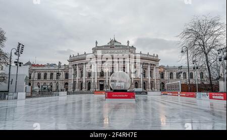 Vienna, Austria - Feb 7, 2020: Empty rink outside city hall with view of Burgtheater accross the street Stock Photo