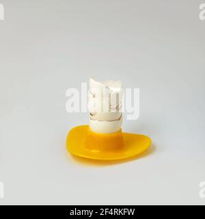 Egg cup full of cracked empty egg shells; Happy Easter minimal concept, with copy space Stock Photo