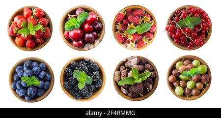Berries and fruits isolated on white background. Collage of different fruits and berries. Raspberry, strawberry, currant, cherry, mulberry, blueberry, Stock Photo