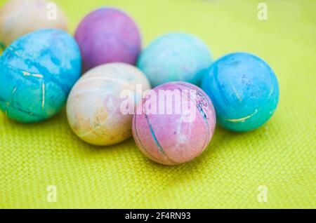Watercolor background with colorful rainbow Easter eggs. Beautiful template for your design. Stock Photo