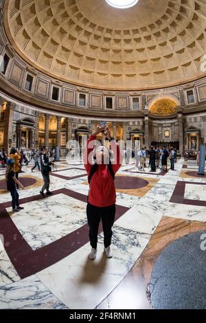 Rome, Italy - Oct 05, 2018: Tourists visiting the interior of the Pantheon Stock Photo