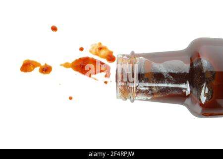 Bottle of barbecue sauce and splashes isolated on white background Stock Photo