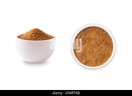 Heap of coconut sugar isolated on white background. Heap of coconut sugar on white. Dark sugar isolated on white. Organic coconut unrefined sugar, iso Stock Photo
