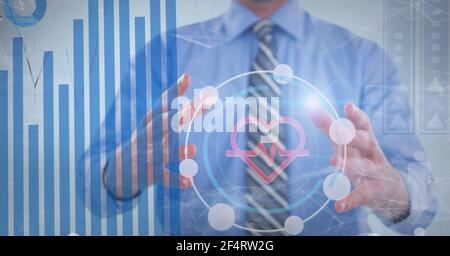 Medical and statistical data processing against mid section of businessman Stock Photo