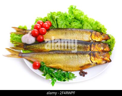 Appetizing smoked fish on a platter Stock Photo