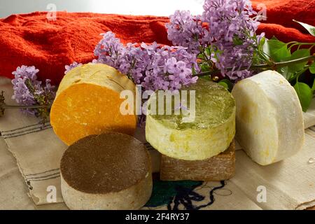 redbud flower and various soaps Stock Photo