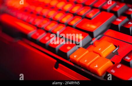 Gaming keyboard from computer close-up with color backlight. Stock Photo