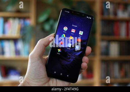 WARSAW, POLAND - JANUARY 29, 2021: User looking at Google app icons on an Android OS, Xiaomi brand smart phone. Stock Photo